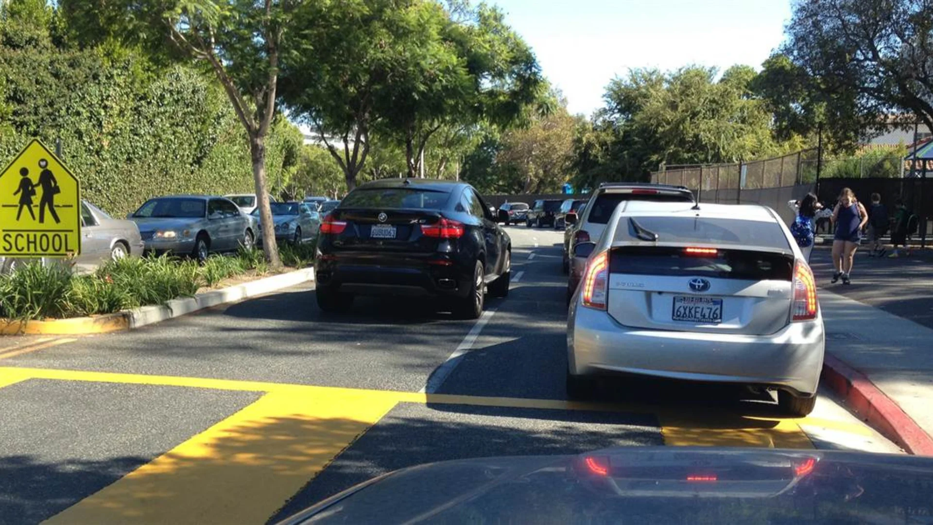 Tired of Long Car Lines Why Implementing A Car Rider App Helps Staff